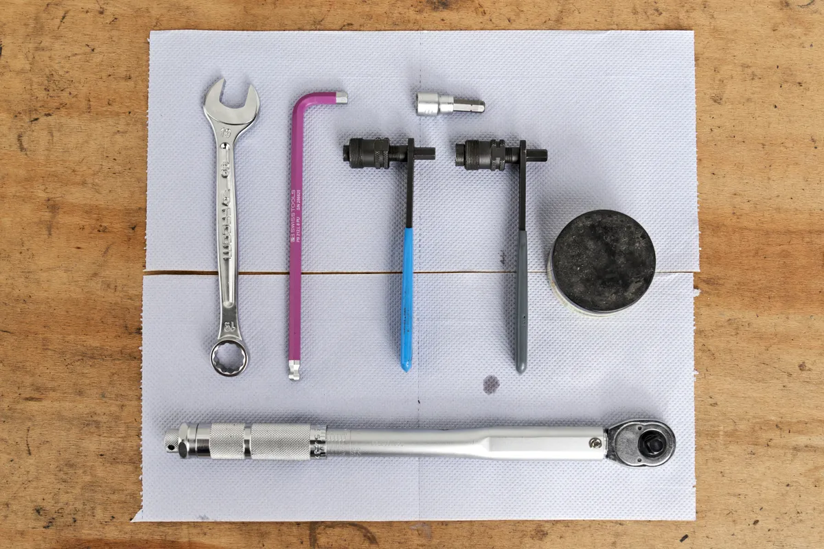 Tools required to remove three-piece cranksets.