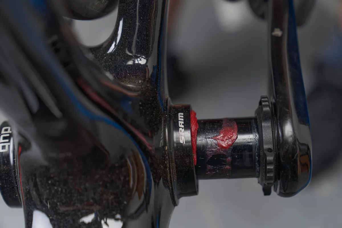 Muc-Off Bio Grease being applied to SRAM spindle.