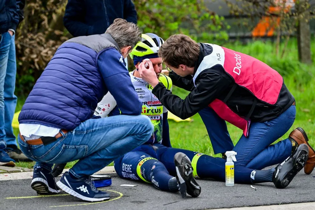 Netherlands' Dutch Taco van der Hoorn of Intermarche-Circus-Wanty receives medical attention during the men's Tour of Flanders one day cycling event, 273,4km from Bruges to Oudenaarde, on April 2, 2023. (Photo by DIRK WAEM / Belga / AFP) / Belgium OUT (Photo by DIRK WAEM/Belga/AFP via Getty Images)