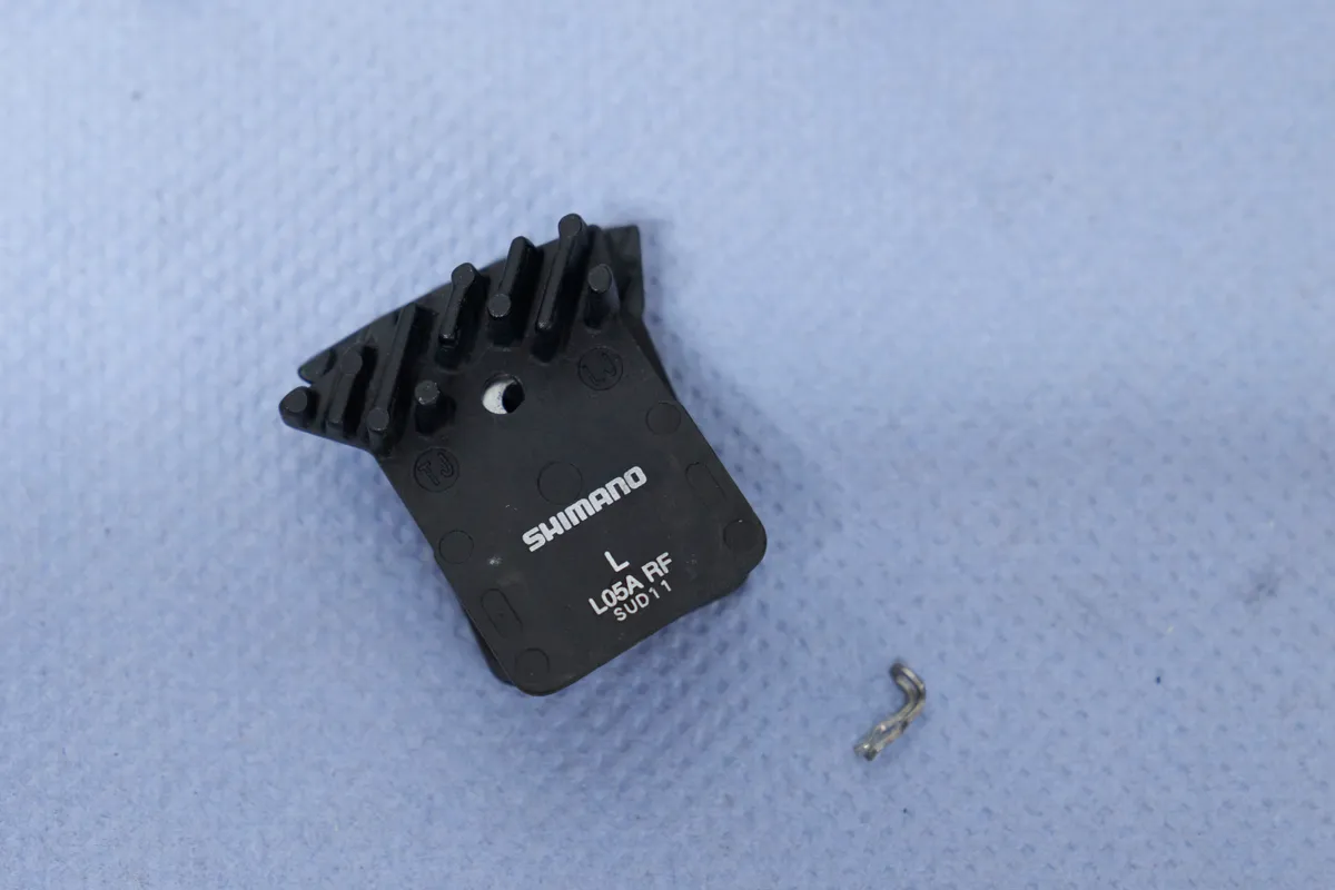 Shimano L05A disc brake pads on a blue towel