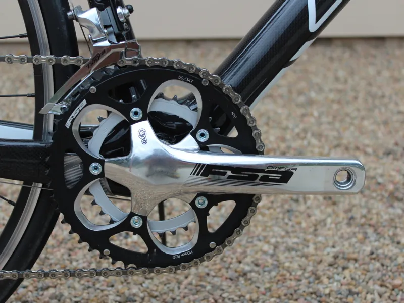 A compact crank offers a smaller range of chainrings than a standard crank
