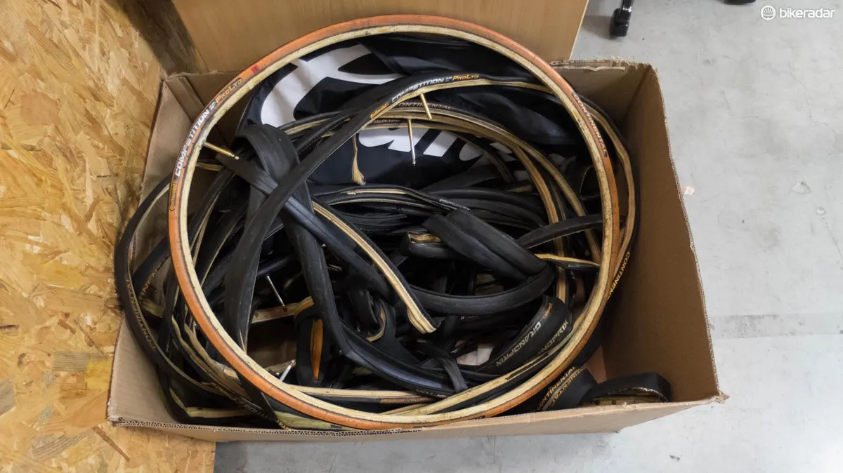 A box of worn-out tyres
