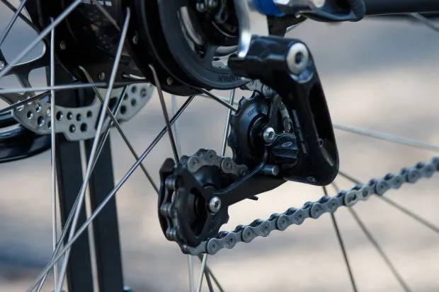 At the back, the Trekking Step-Through features Shimano's ALFINE 8s internal gearing and an Alfine chain tensioner