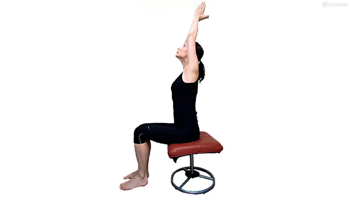 Another office chair-based stretch that will release tension in muscles throughout the back