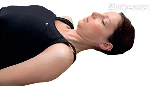 Second, gradually 'nod' your head downwards towards your chest. You should feel the stretch up the back of your neck