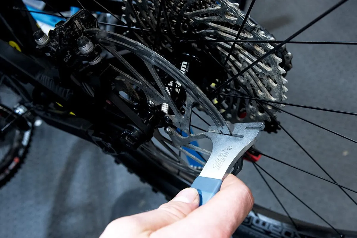 If your disc rotor is bent, you can attempt to bend it back, within reason.