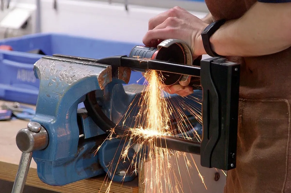 Sparks flew as the angle grinder was introduced