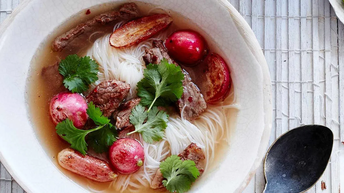 Bowl of noodles, meat and radish