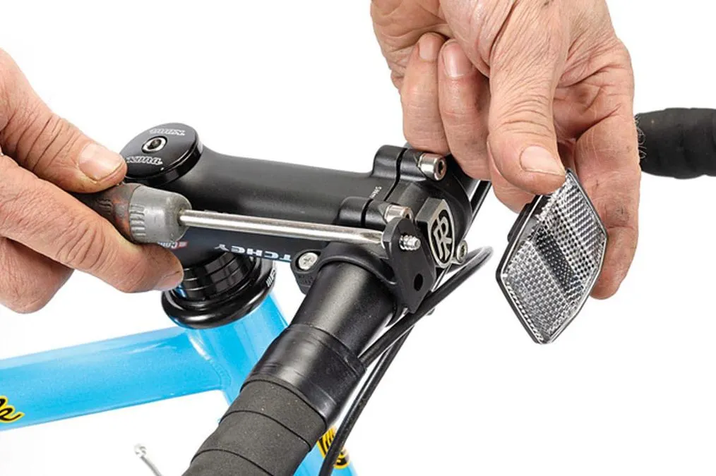 Fit some reflectors – many bike shops will sell their spare ones to you at a knock-down price.
