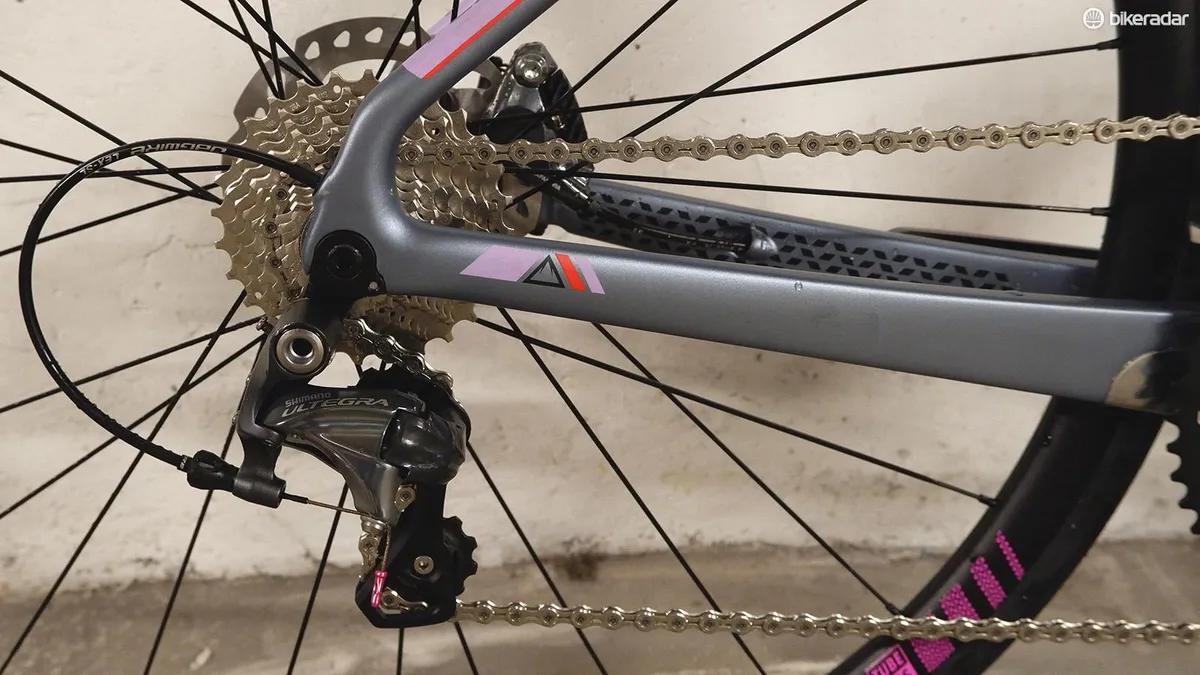 Close-up detail of cassette, chain and rear derailleur on the Fuji Supreme 2.3 women's road bike