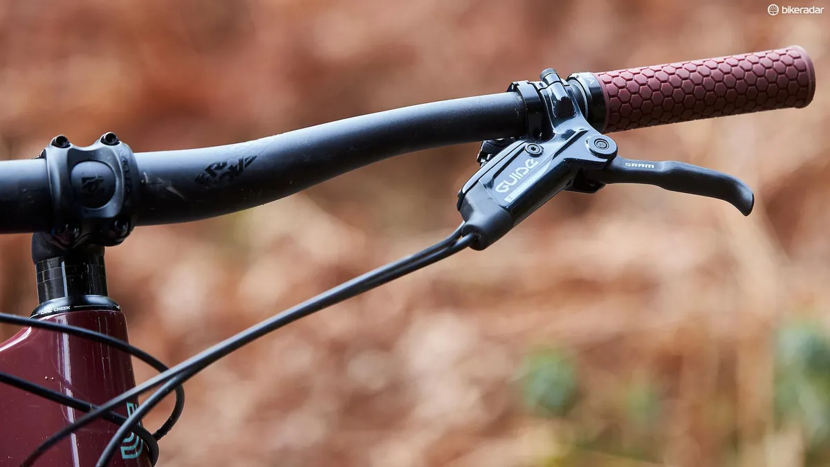 Close-up photograph of black handlebars on the Juliana Furtardo mountain bike