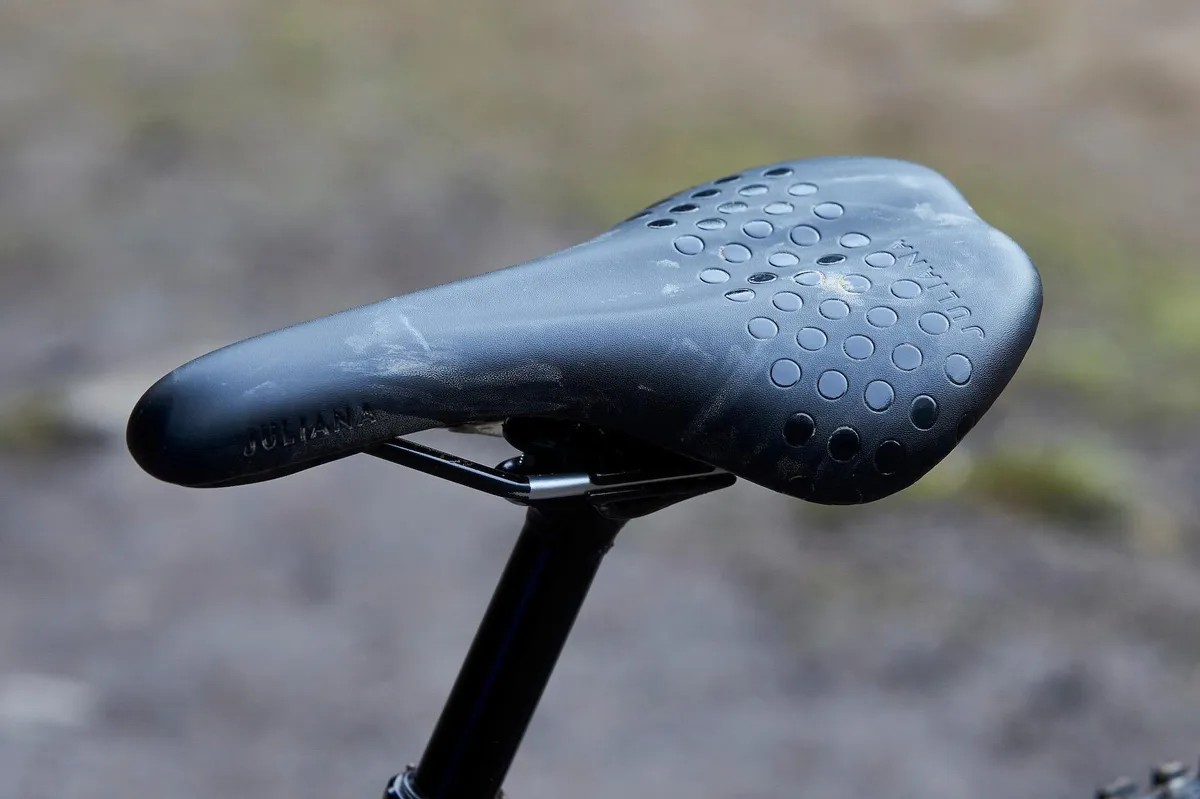 The Juliana-branded women's mountain bike saddle which is black with a dotted pattern