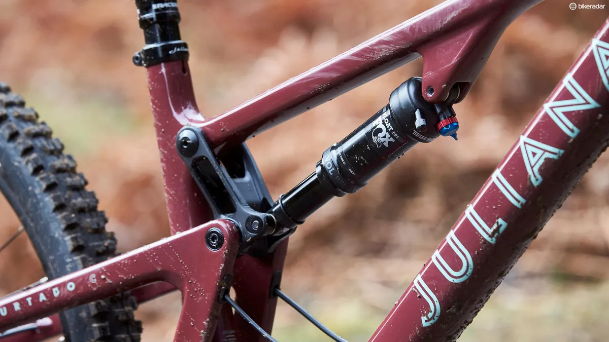 Detail photograph showing the rear suspension system and frame of the Juliana Furtado mountain bike