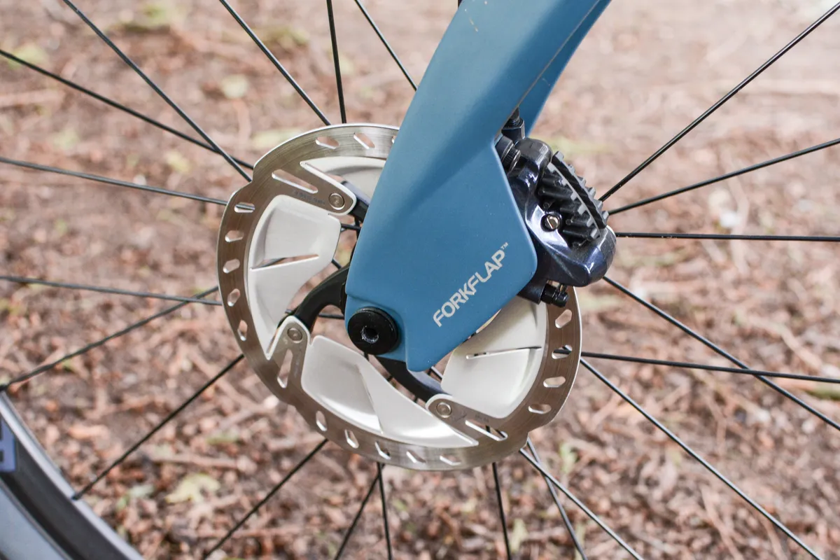 Aero 'Forkflap' covering disc brake caliper