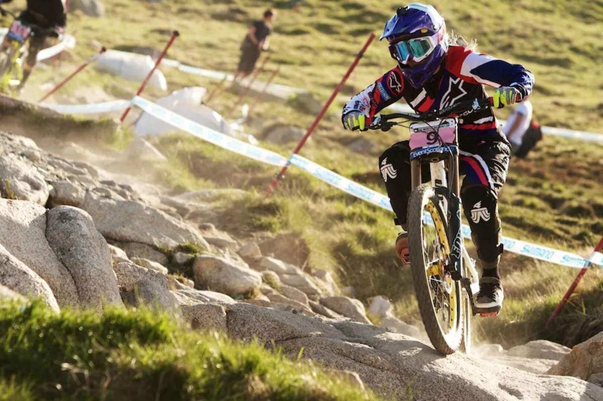 Downhill mountain bikes have 200mm of travel front and rear, which allows racers like Tracey Hannah to ride through some incredibly steep and technical terrain