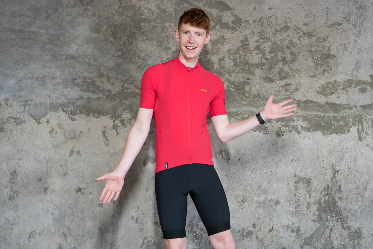 Model wearing cycling shorts and jersey