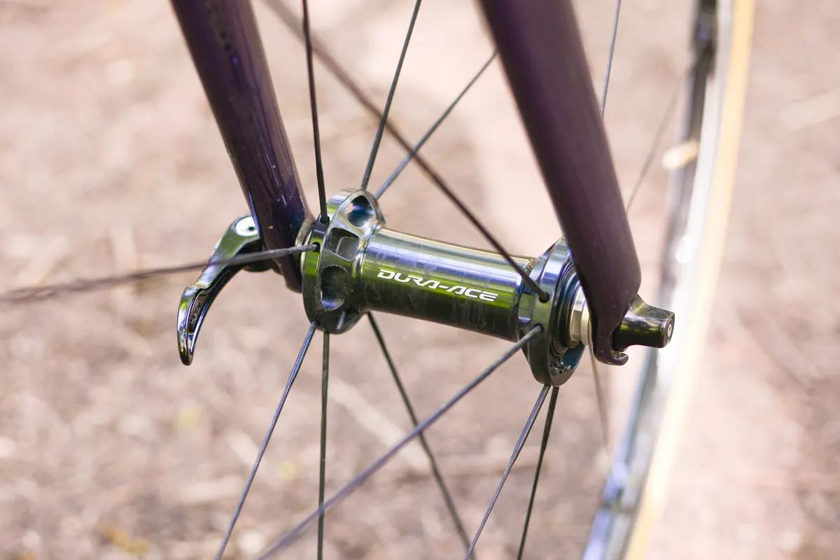 Close-up of road bike front wheel showing hub