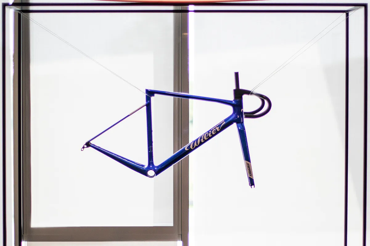 Blue road bike frame on white background