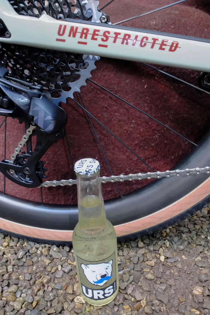 USR bottle of beer and USR gravel bike