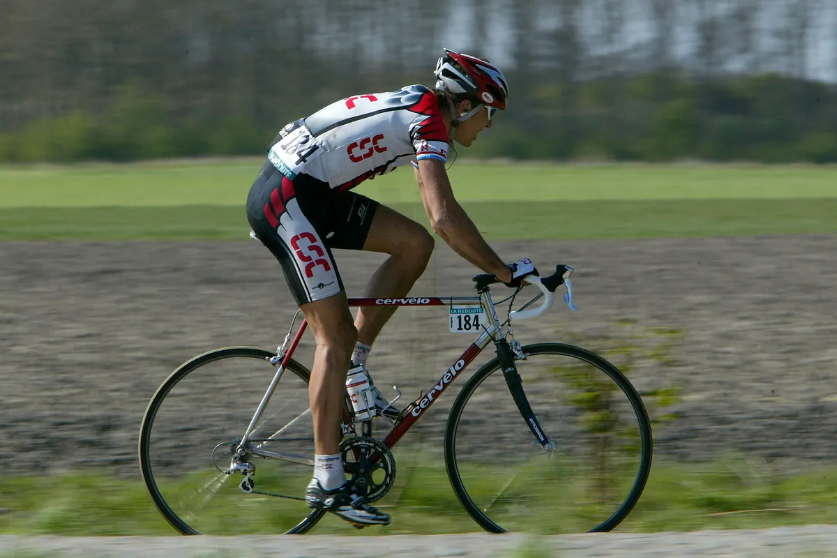 2003 pro cyclist riding steel bike