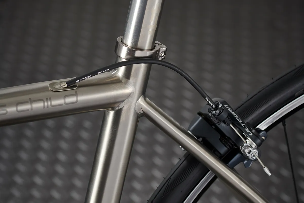 The frame of a sabbath road bike showing internal cabling