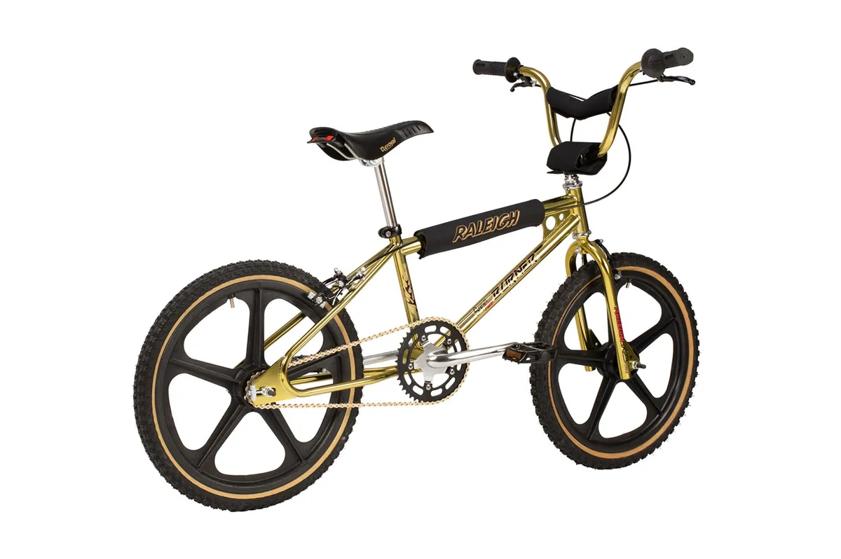 Gold BMC bike.