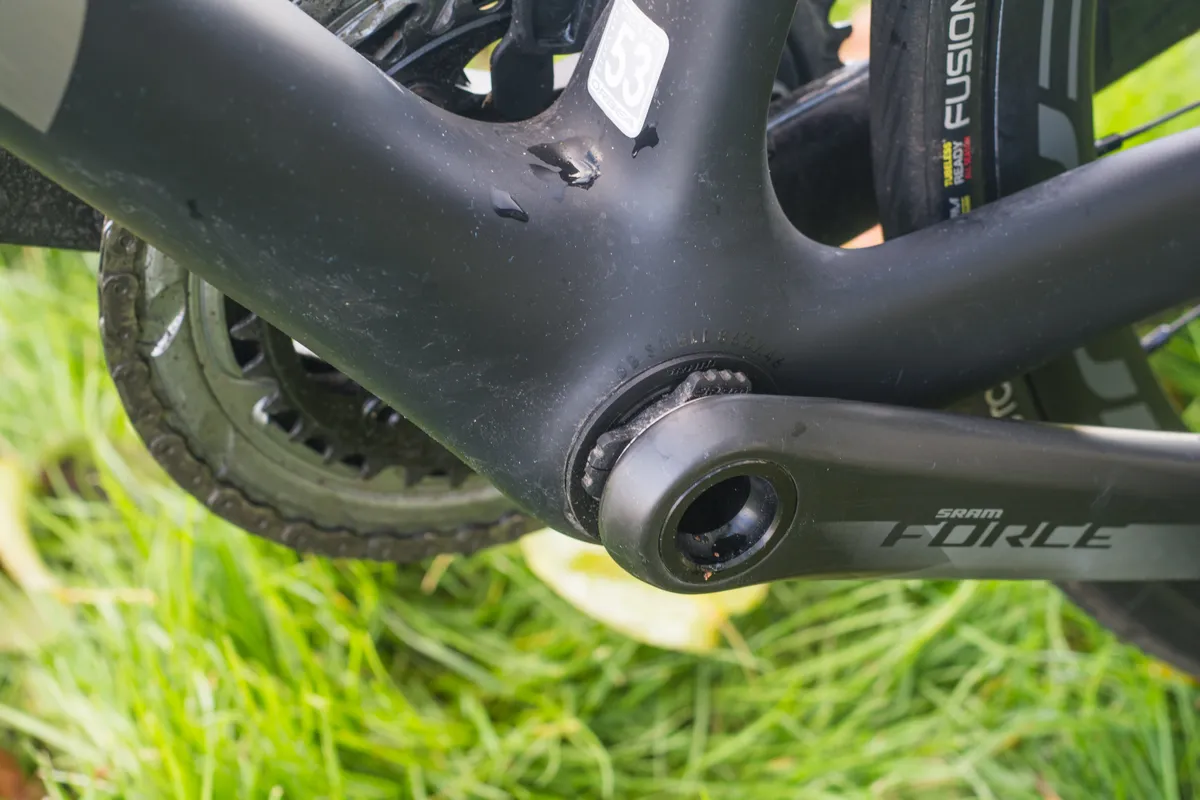 Bottom bracket area of road bike with SRAM DUB crank.