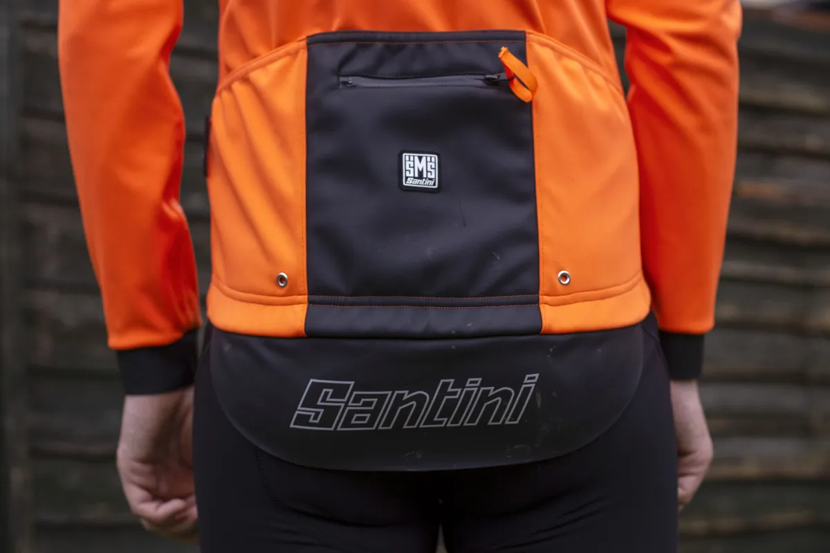 Santini Multi Vega jacket orange back pocket and flap