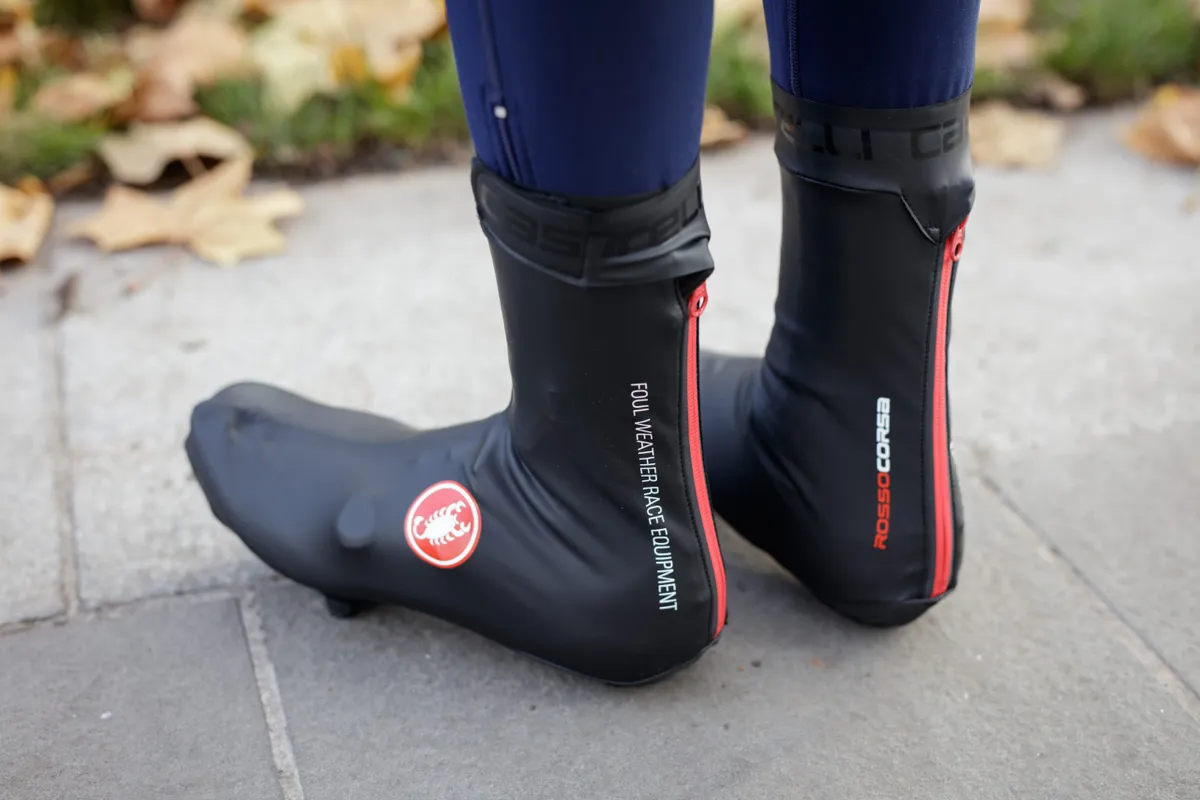 Cycling overshoes with red zips