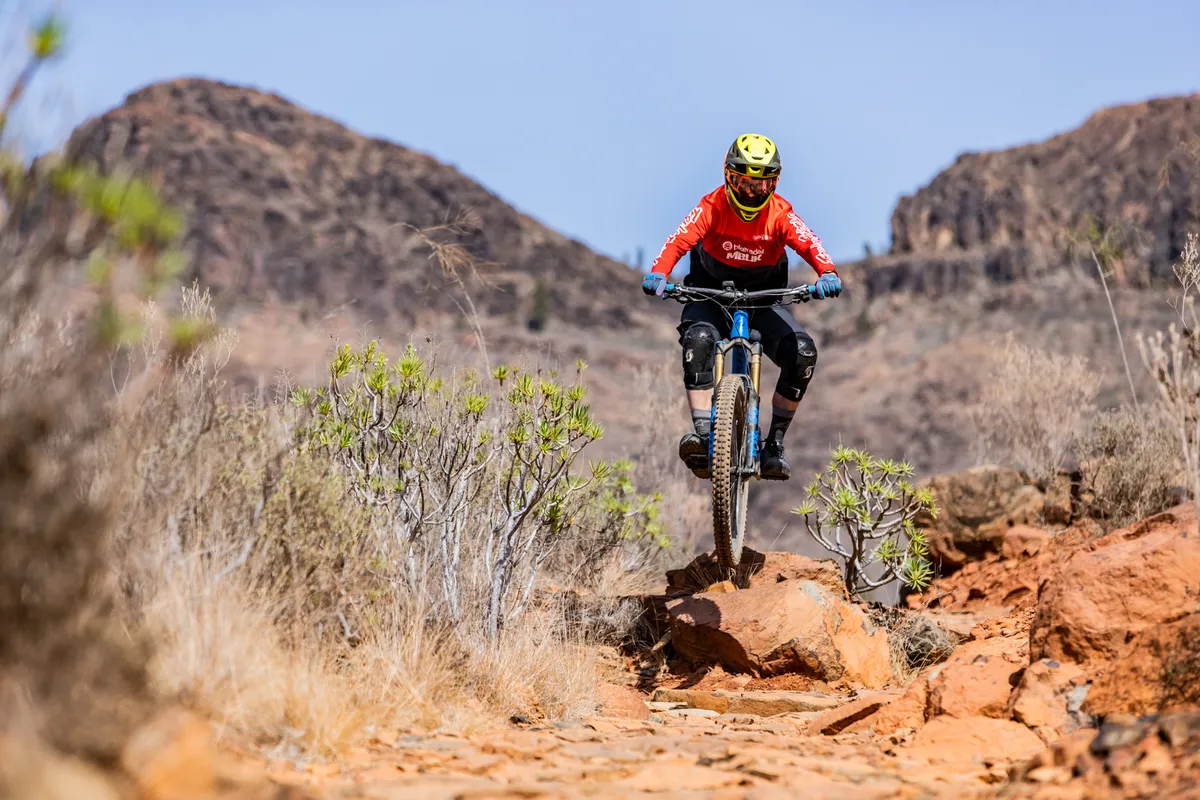 Alex Evans riding a Pivot Switchblade trail/enduro mountain bike