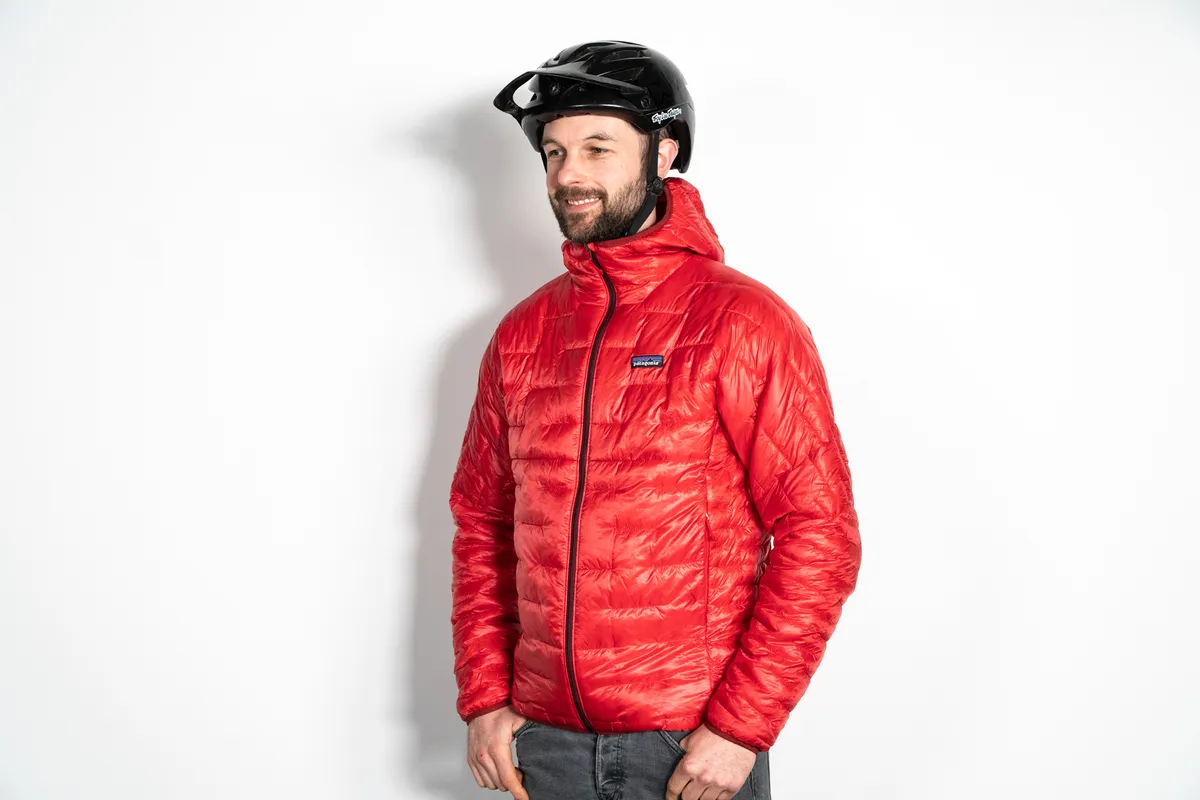 Patagonia Micro Puff Hoody worn by male wearing a Troy Lee Designs cycling helmet