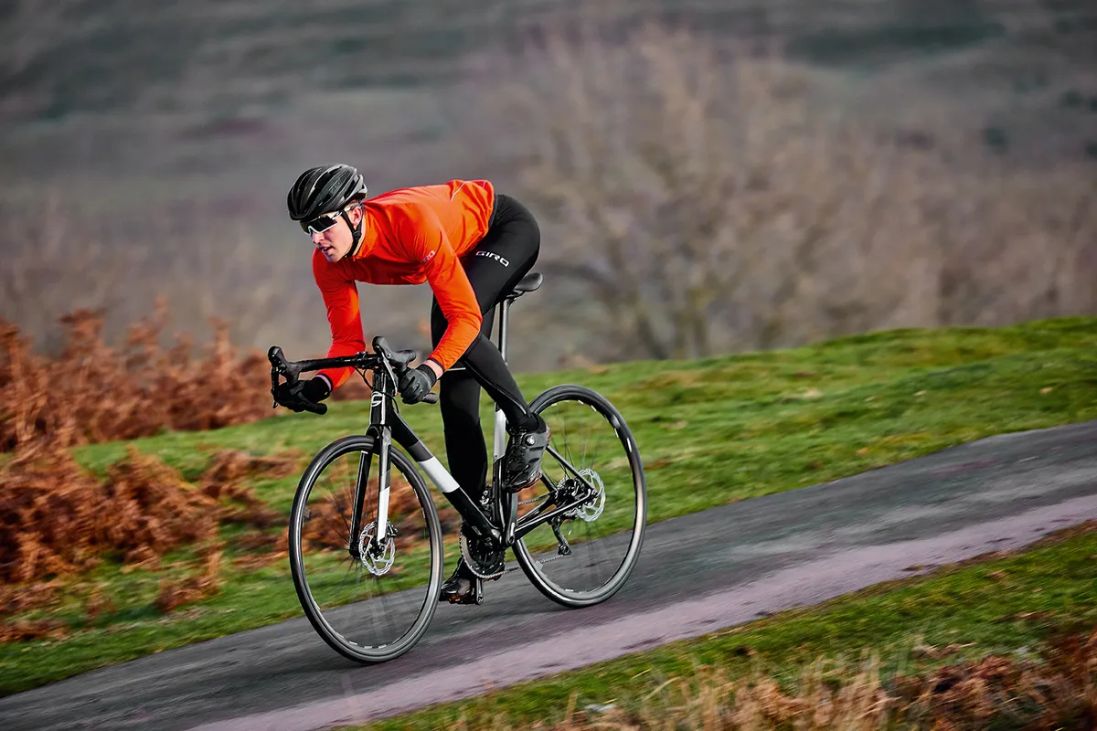 Cyclist riding a Cannondale SuperSix Carbon road bike