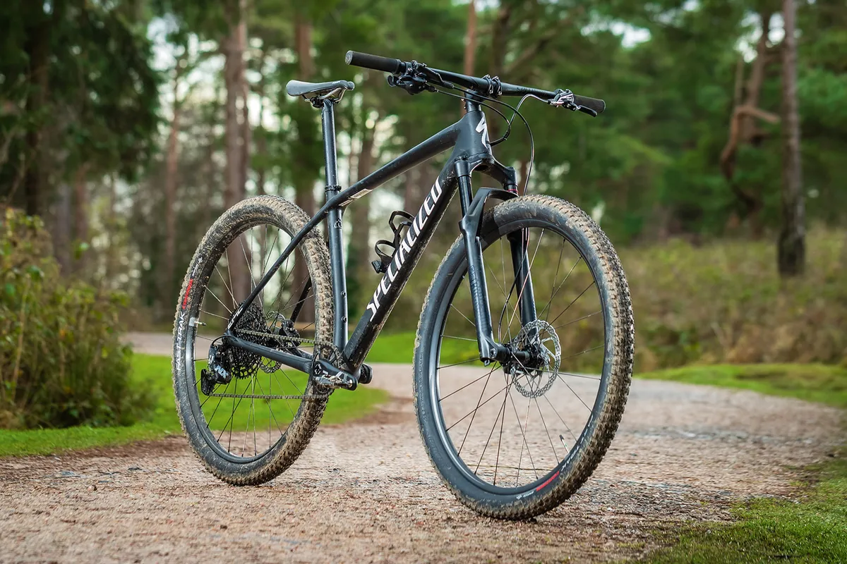 Angled pack shot of a black Specialized Epic Hardtail mountain bike
