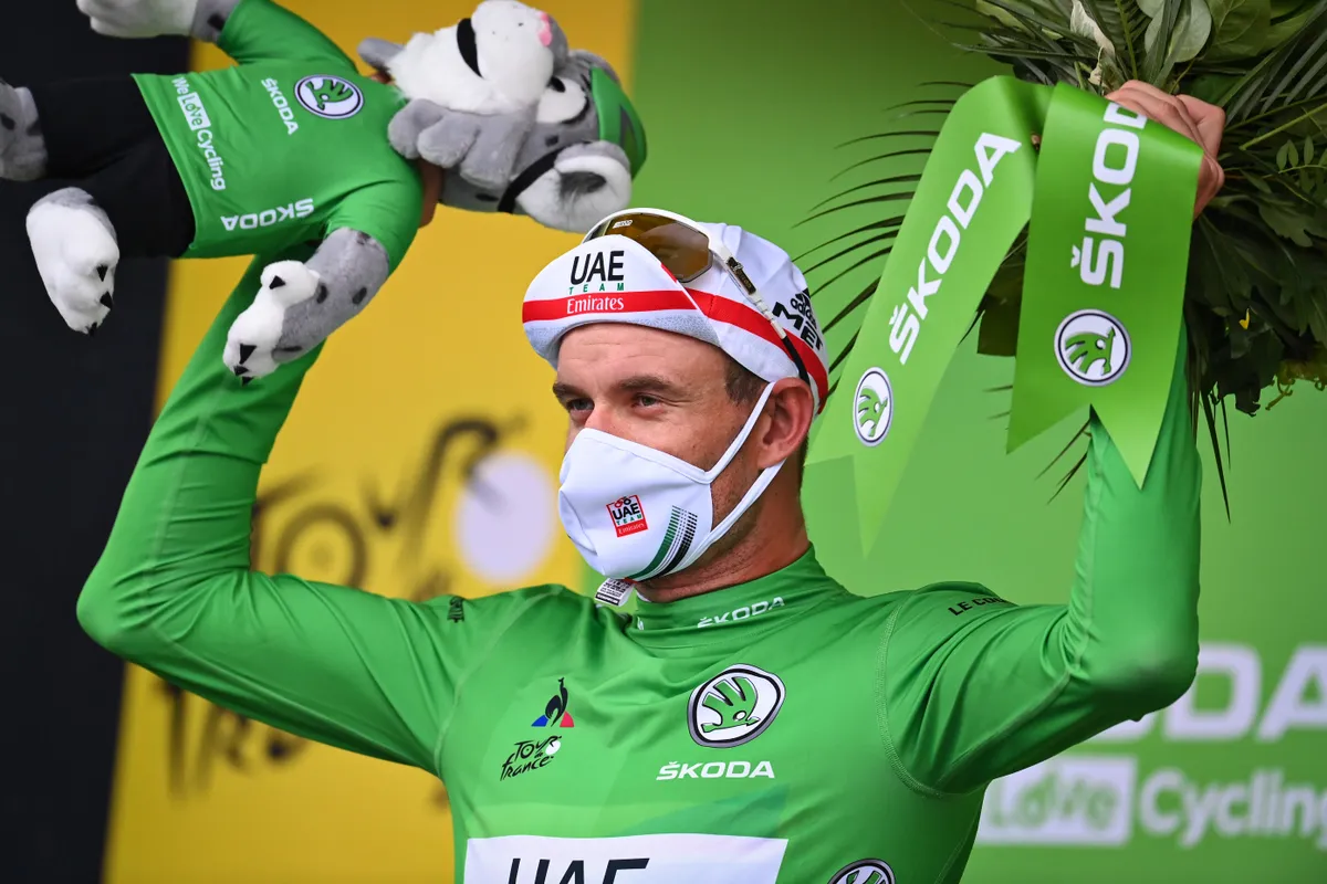 Norwegian Alexander Kristoff of UAE Team Emirates celebrates on the podium in the green jersey of leader in the sprint ranking after the first stage of the 107th edition of the Tour de France cycling race, 156km from Nice to Nice, in France, Saturday 29 August 2020. This year's Tour de France was postponed due to the worldwide Covid-19 pandemic. The 2020 race starts in Nice on Saturday 29 August and ends on 20 September. BELGA PHOTO POOL PHOTONEWS (Photo by POOL PHOTONEWS/BELGA MAG/AFP via Getty Images)