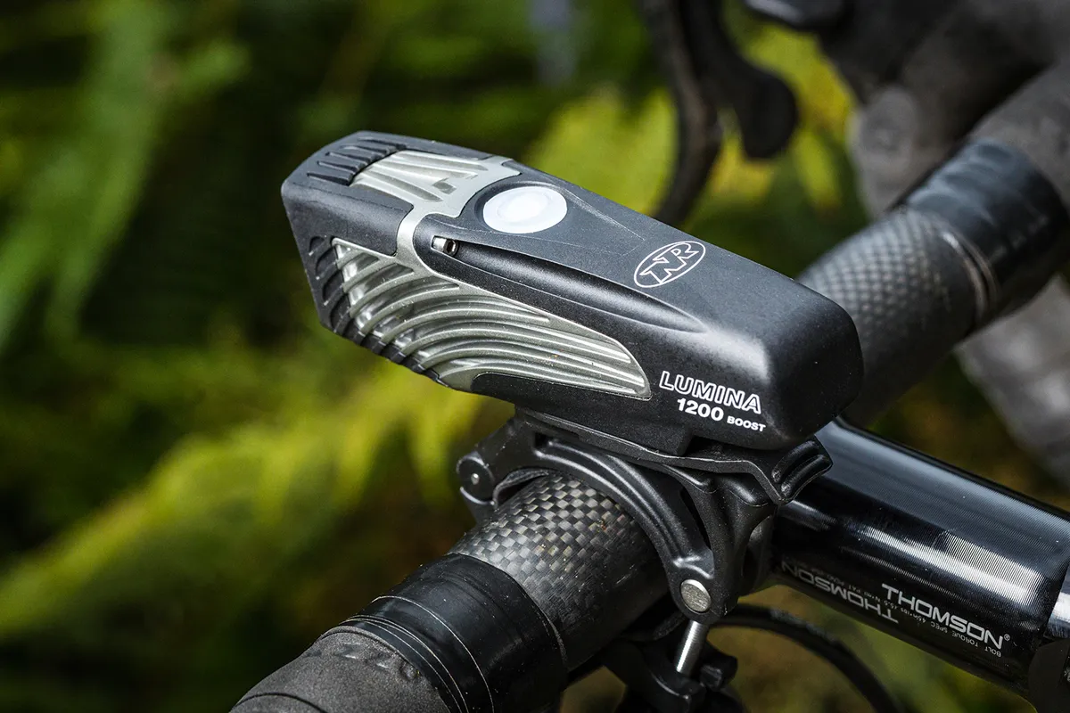 Angled view Niterider Lumina 1200 Boost front light for road cycling