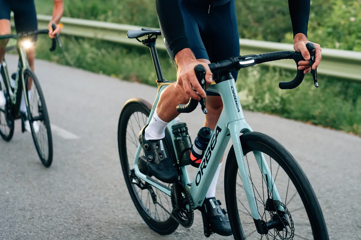 Male cyclist riding the Orbea Gain Carbon road eBike