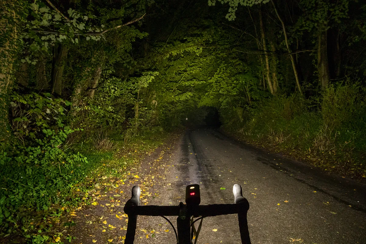 Ravemen PR1200 front light for road cycling in action