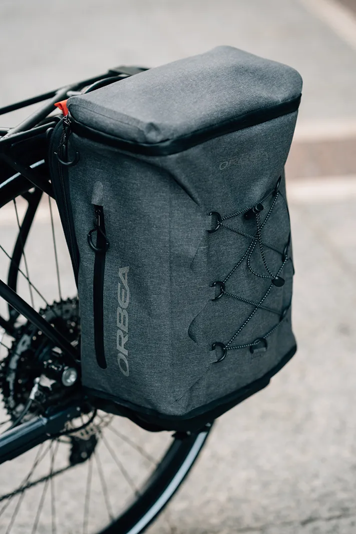 The pannier bag on the Orbea Vibe easily coverts to a back pack for carry off the bike