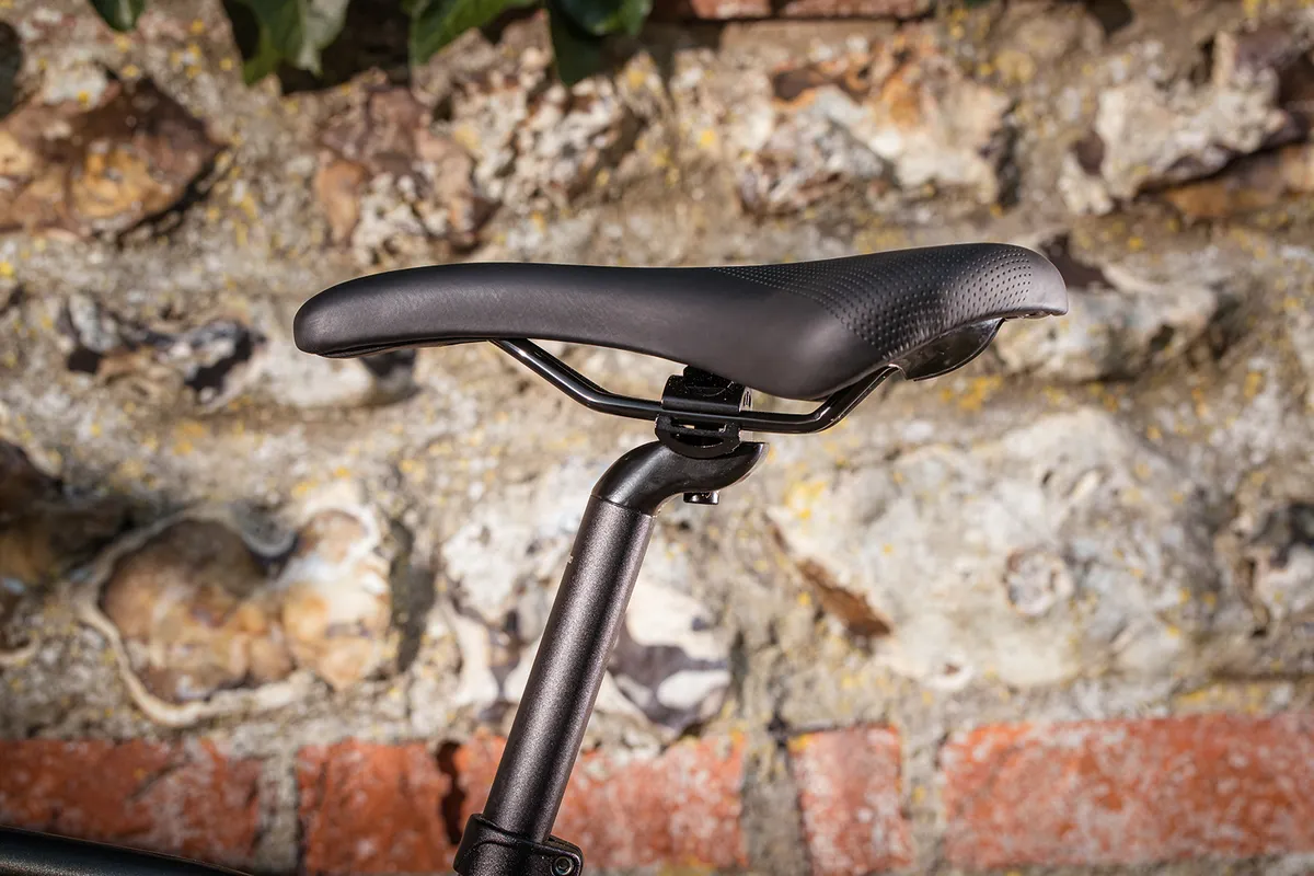 Giant Escape 1 Disc commuter bike has a Giant Sport Comfort saddle sits on a Giant D-Fuse alloy seatpost