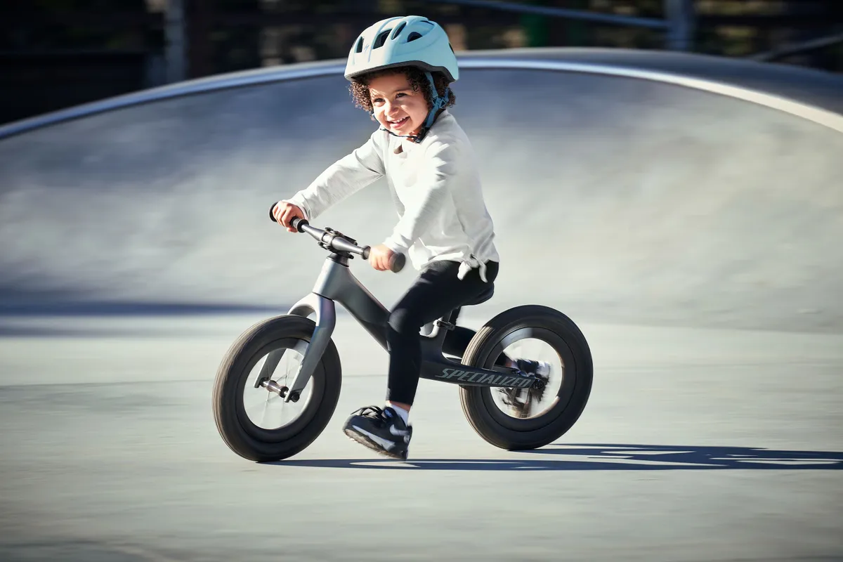 Child riding the Hotwalk Carbon