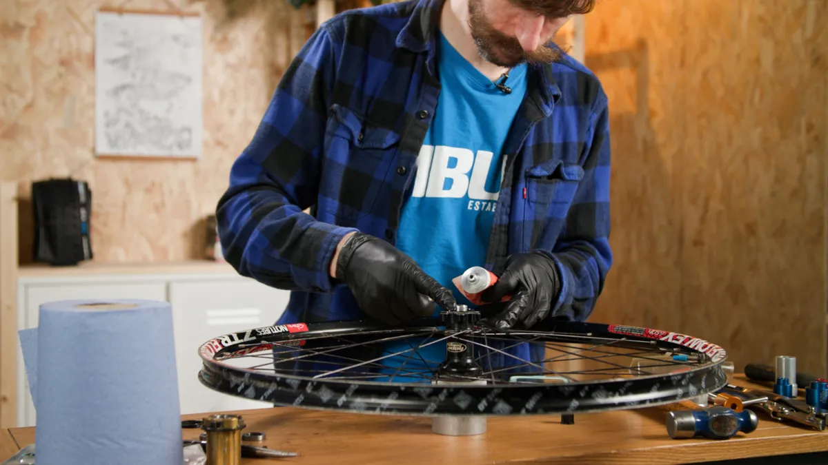 Will Soffe adding grease to hub bearings 