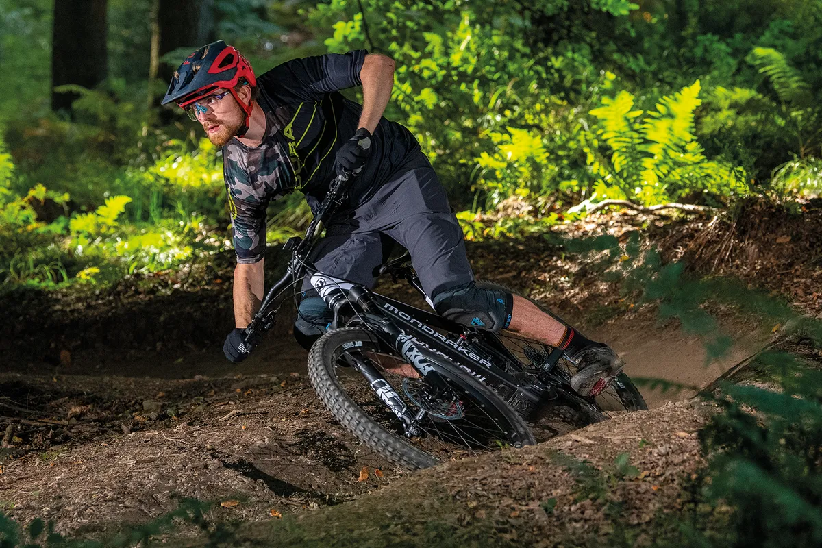 Cyclist in black top riding the Mondraker Crafty R 29 ebike