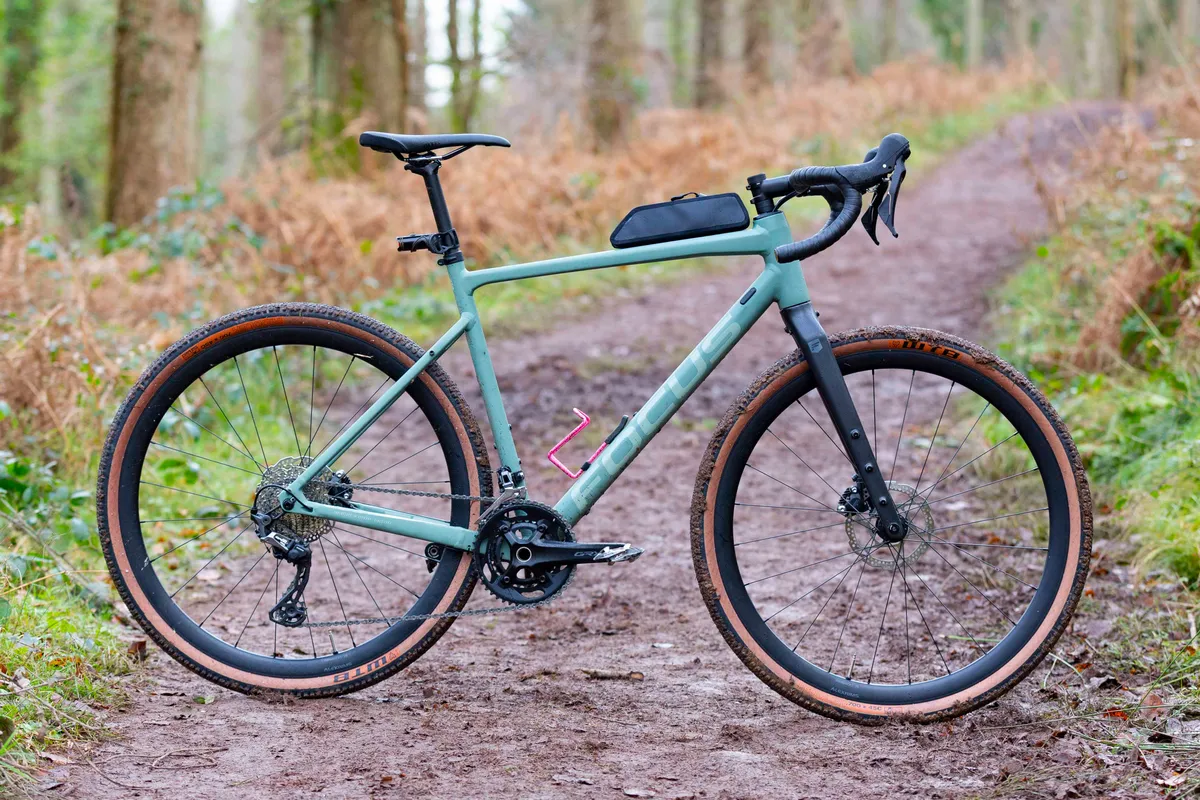 Pack shot of the Focus Atlas 6.8 gravel bike in a forest