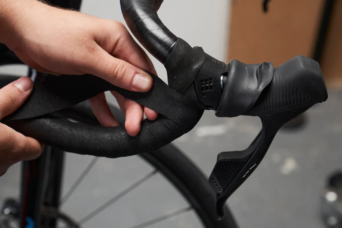 Figure-of-eight bar tape around the shifter