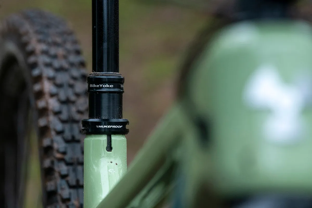 The Nukeproof Giga full-sus mountain bike range use either a Brand-X dropper or BikeYoke seatpost