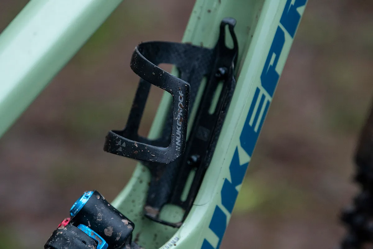 The full range of the Nukeproof Giga full suspension mountain bikes come with custom bottle cage