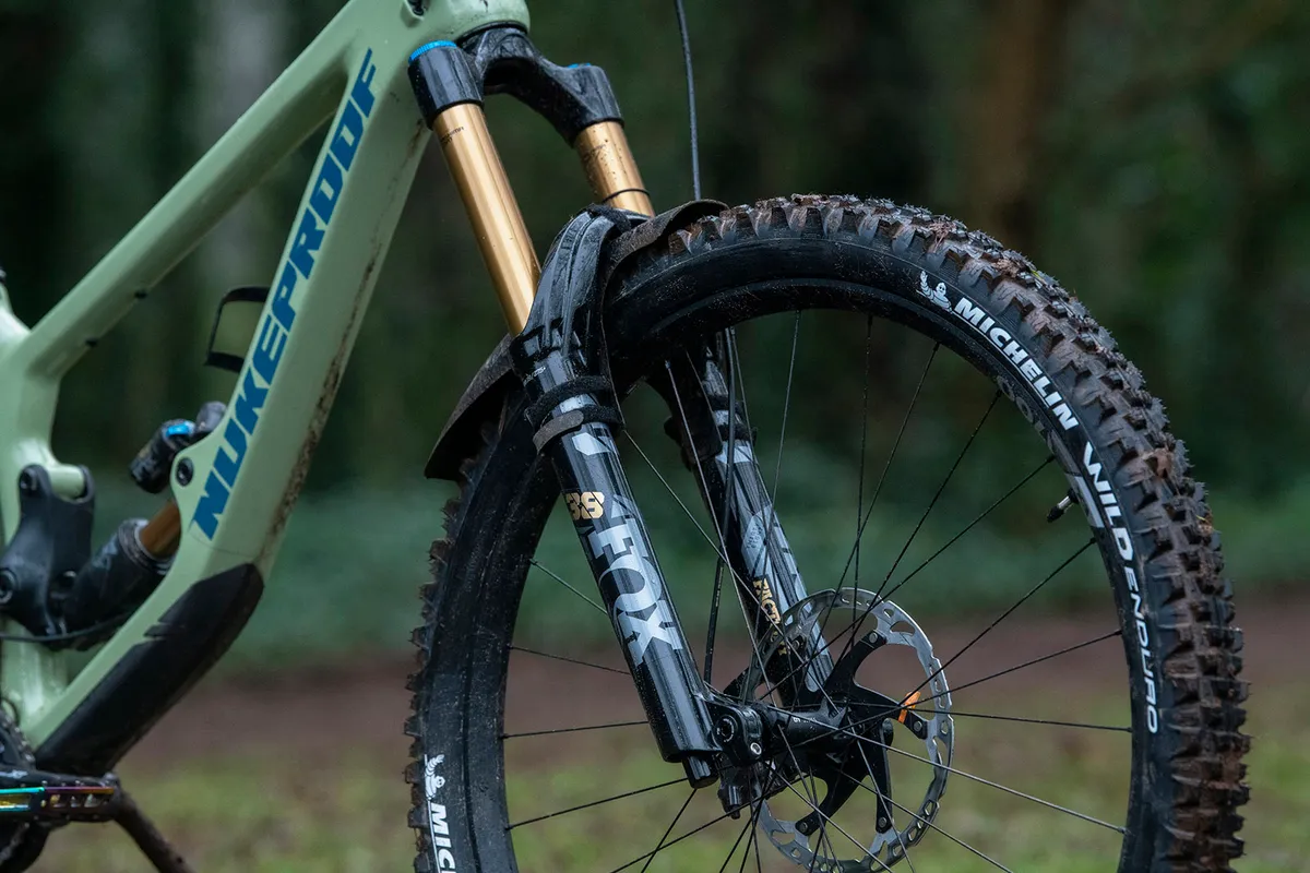 Top of the Nukeproof Giga full suspension mountain bike comes with a Fox 38 Factory fork