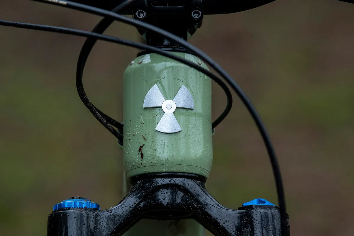 Nukeproof badge on the head tube on the Giga full-suspension mountain bike