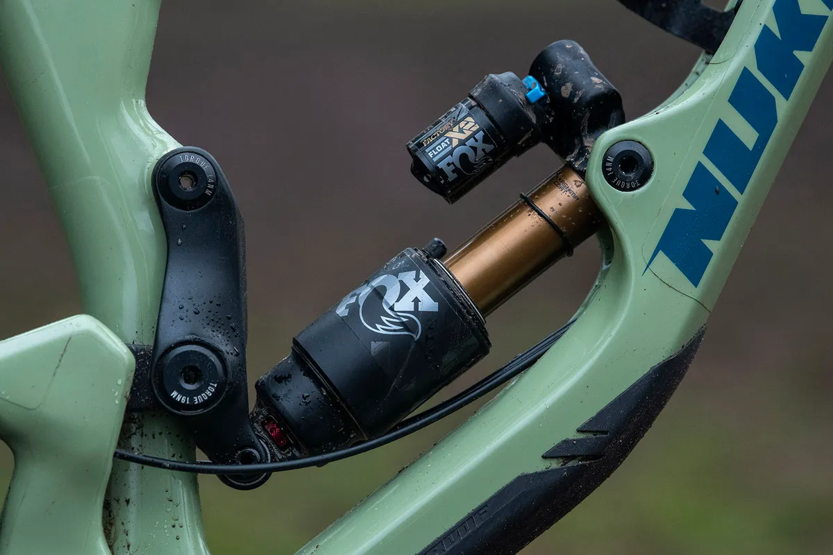 The top of the Nukeproof Giga full suspension mountain bike range comes with a Fox Factory X2 shock