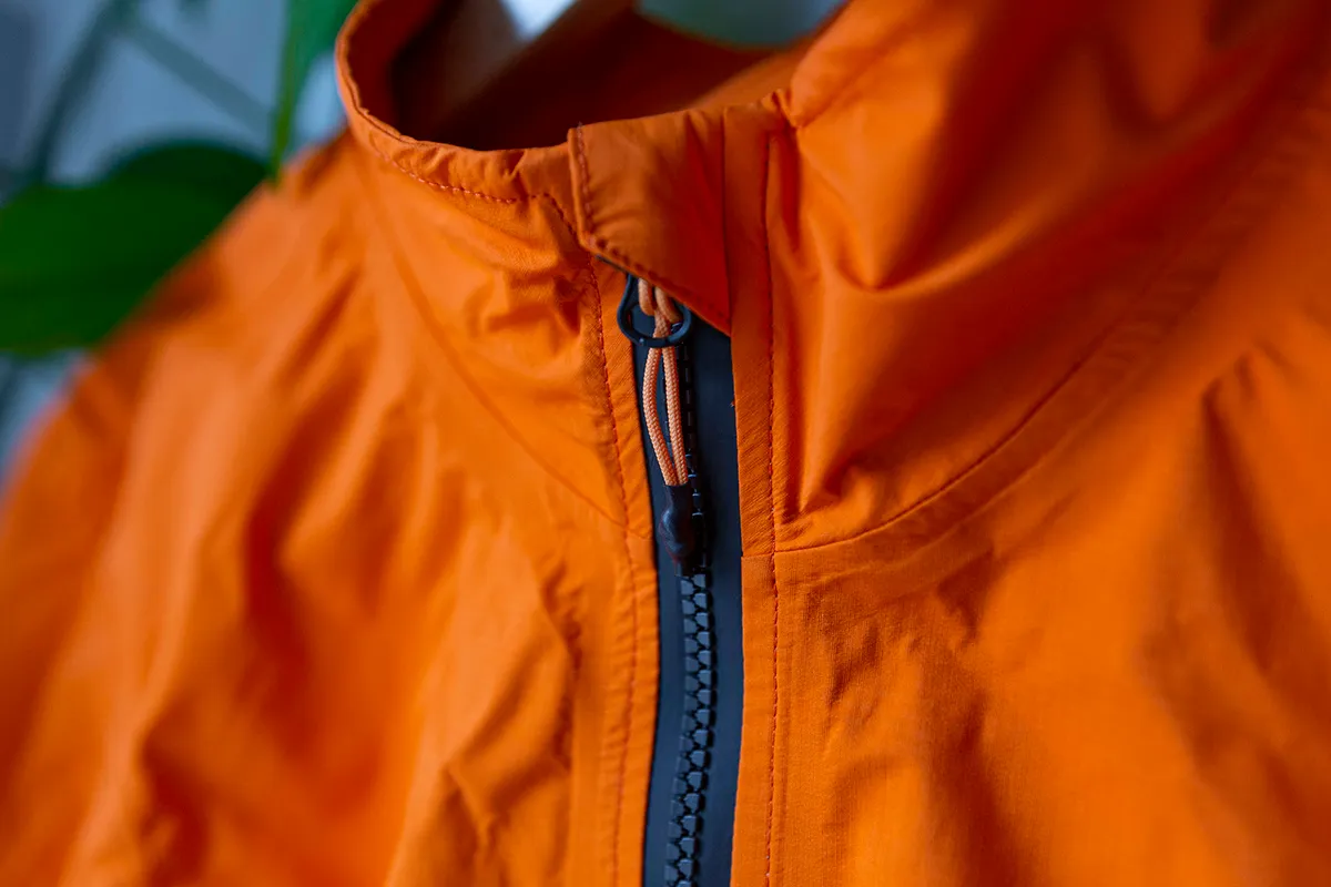 Albion Rain Jacket for road cycling in bright orange